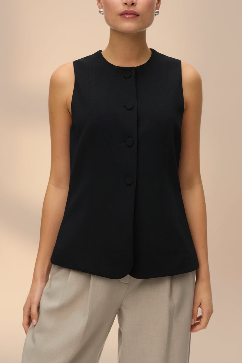 front of a woman wearing Vellore Black Tailored Buttoned Vest from La petite garçonne