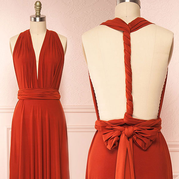 Red dress displayed on a mannequin with a plain background