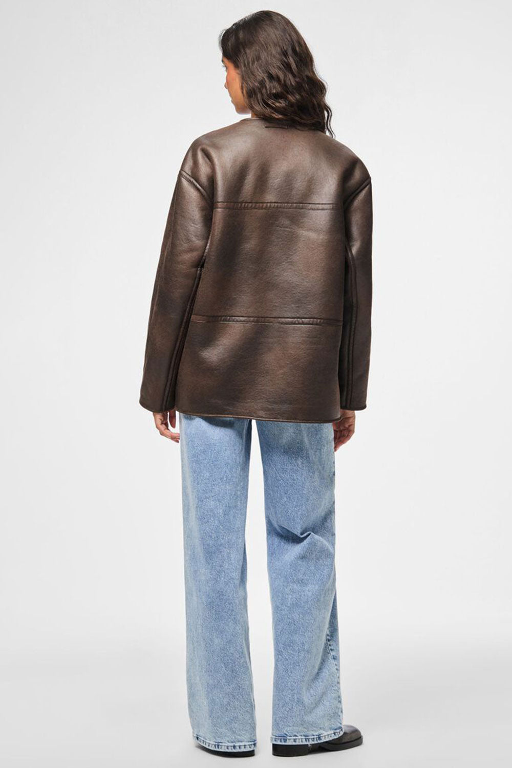 Photo Woman wearing Vista Reversible Faux Leather Loose Jacket backview from La petite garçonne