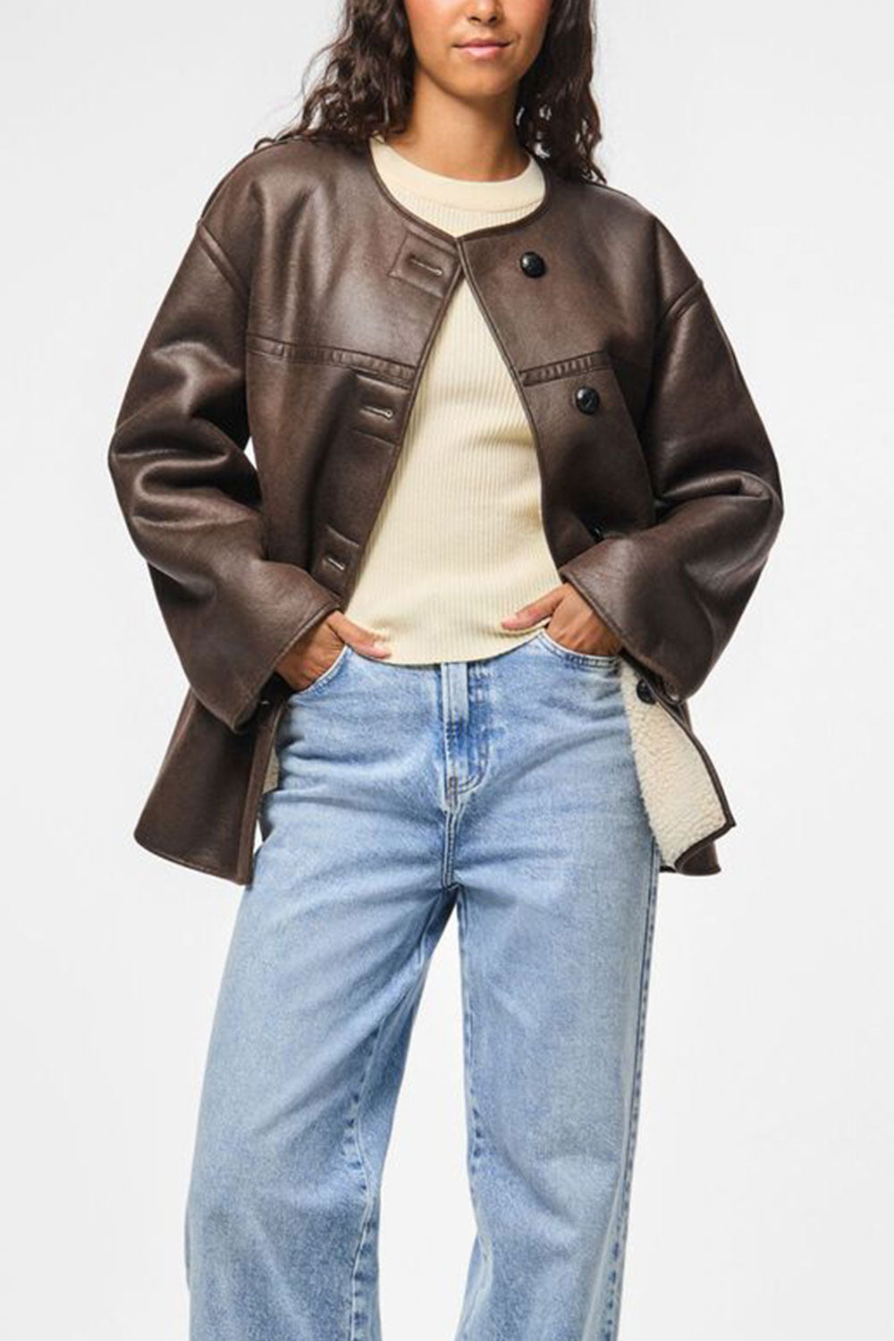 Photo Woman wearing Vista Reversible Faux Leather Loose Jacket from La petite garçonne