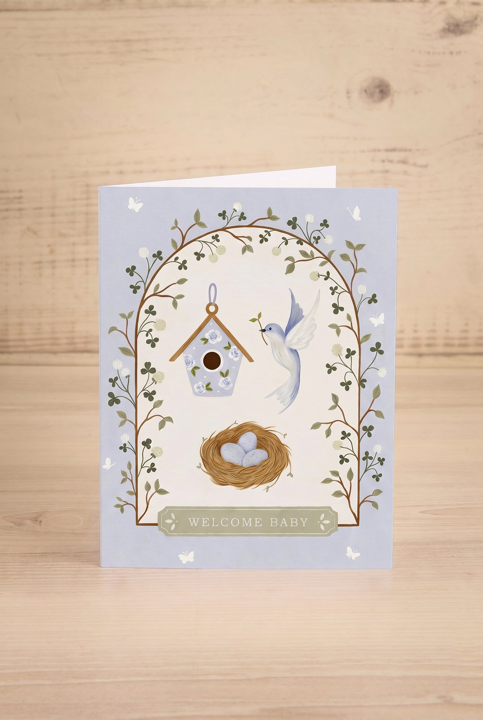 Front view of a greeting card Welcome Baby illustration by Marie Lise at la maison garçonne