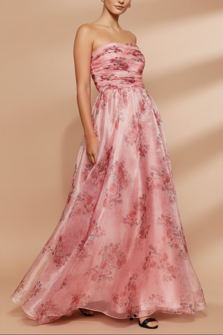 side of women wearing Zouleikha Pink Floral Maxi Strapless Dress from Boutique 1861