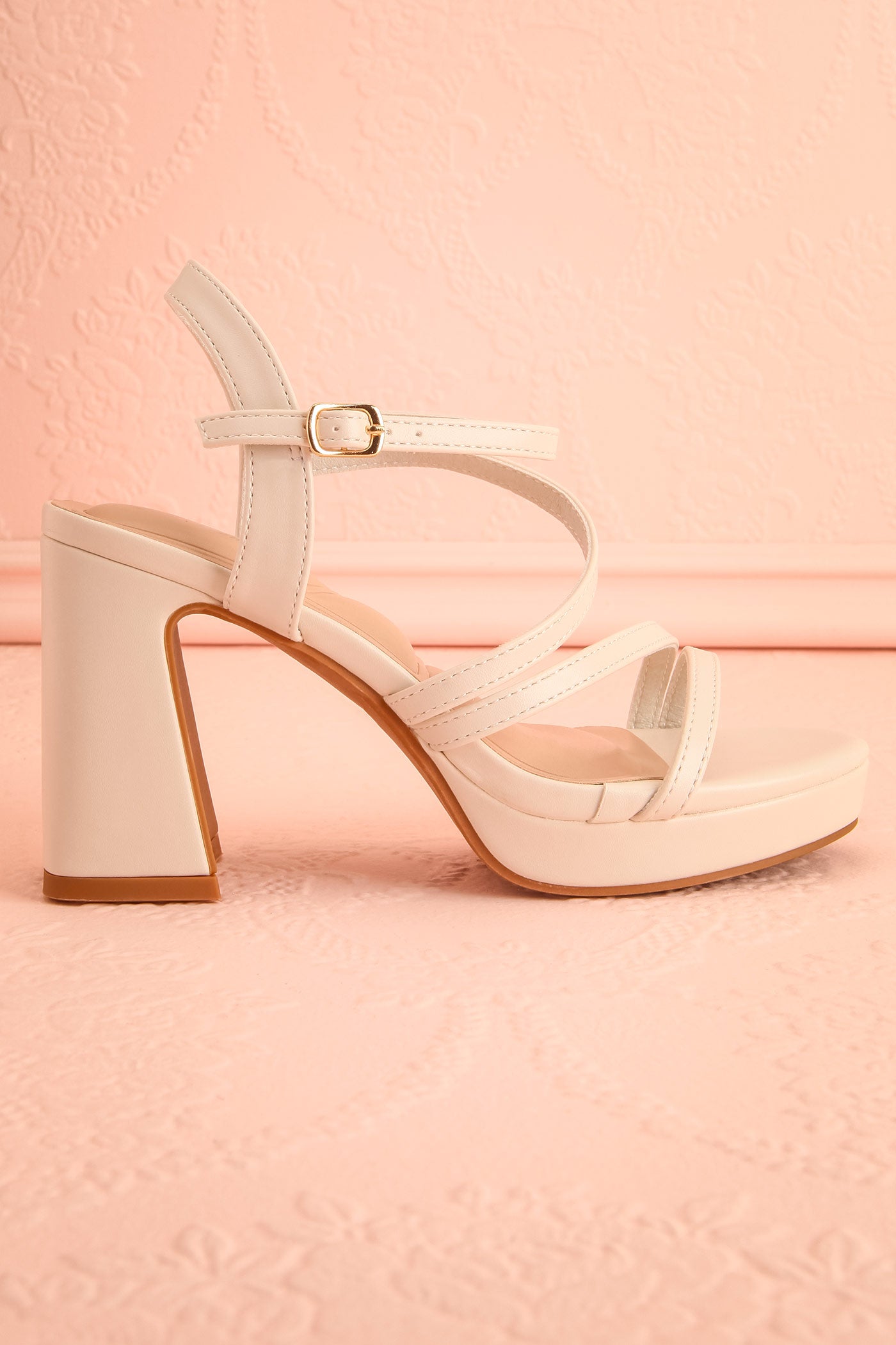Side view of Adina Ivory Strappy Platform Sandals with Block Heel at boutique 1861