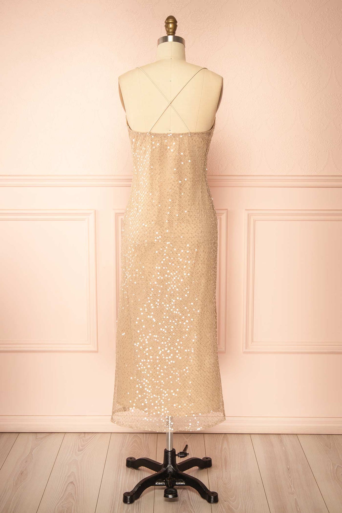 Back view of Alfea Champagne Sequin Mesh Midi Dress with Cowl Neck at Boutique 1861
