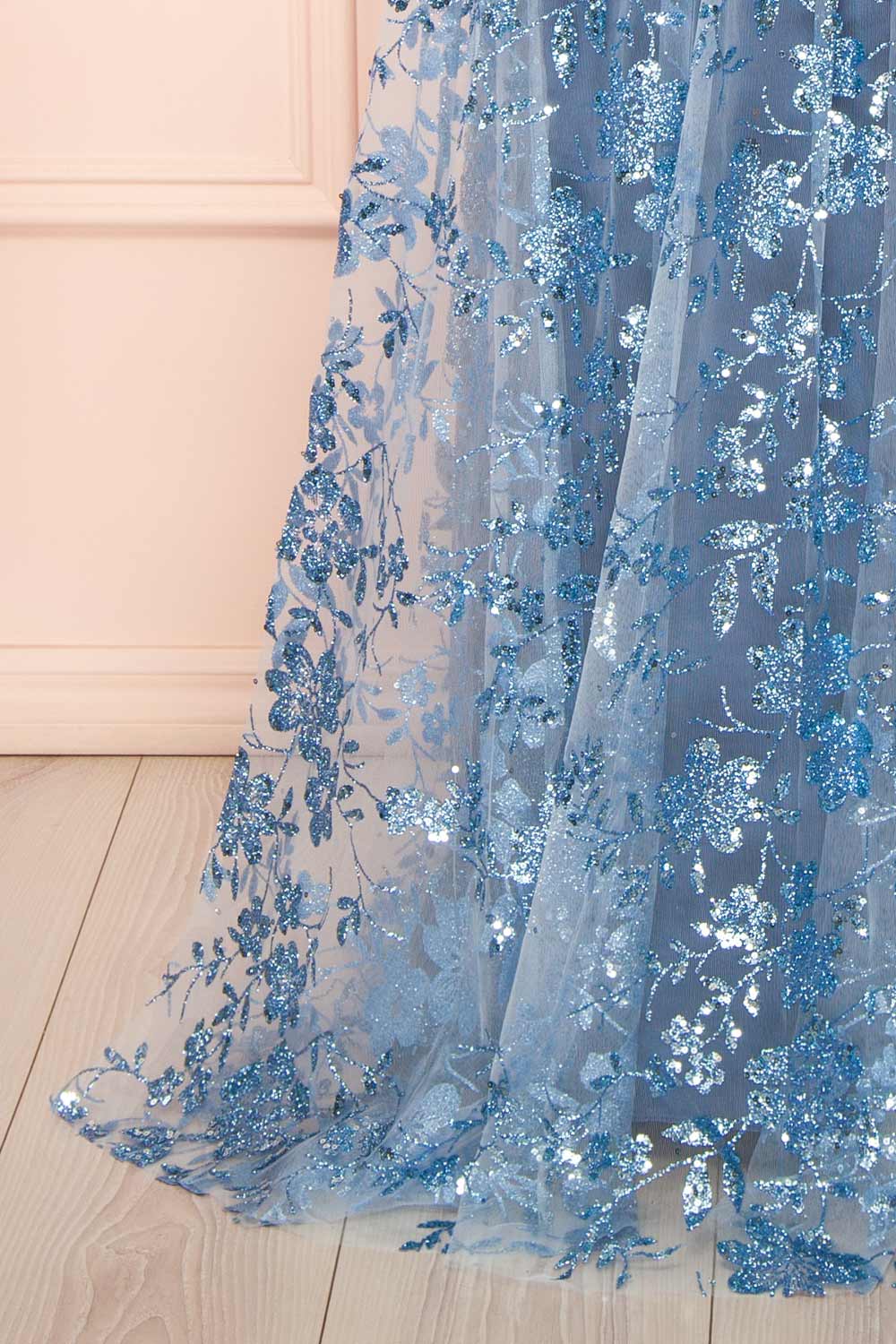 bottom of sewing mannequin wearing Alienor Blue Grey Glittery Off the Shoulder Maxi Dress from Boutique 1861