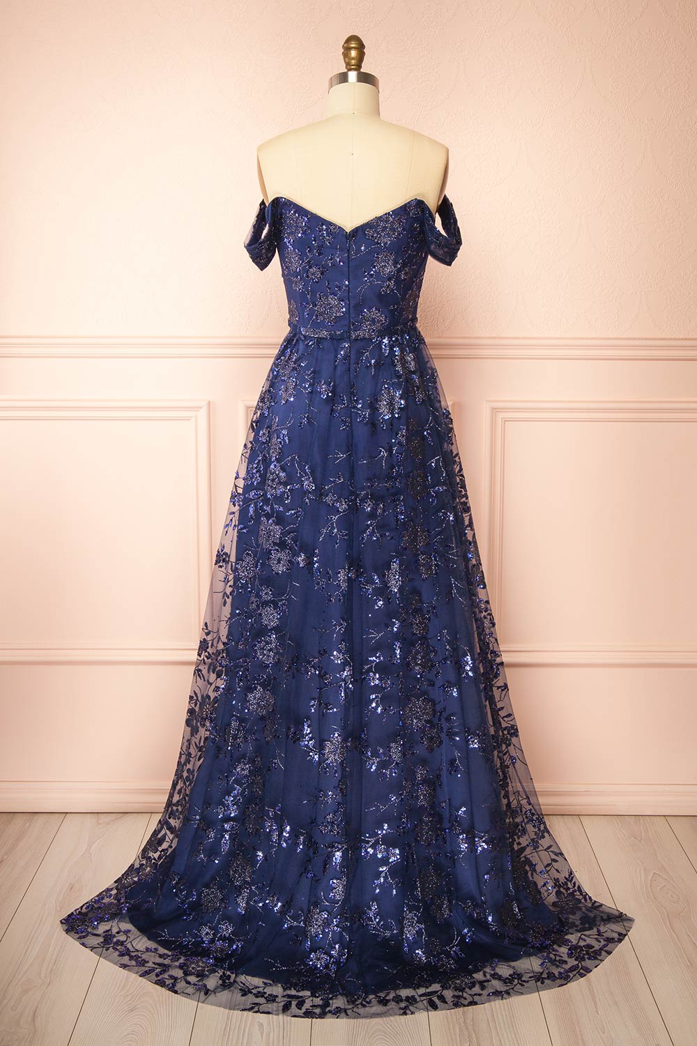 back view of sewing mannequin wearing Alienor navy Glittery Off the Shoulder Maxi Dress from Boutique 1861