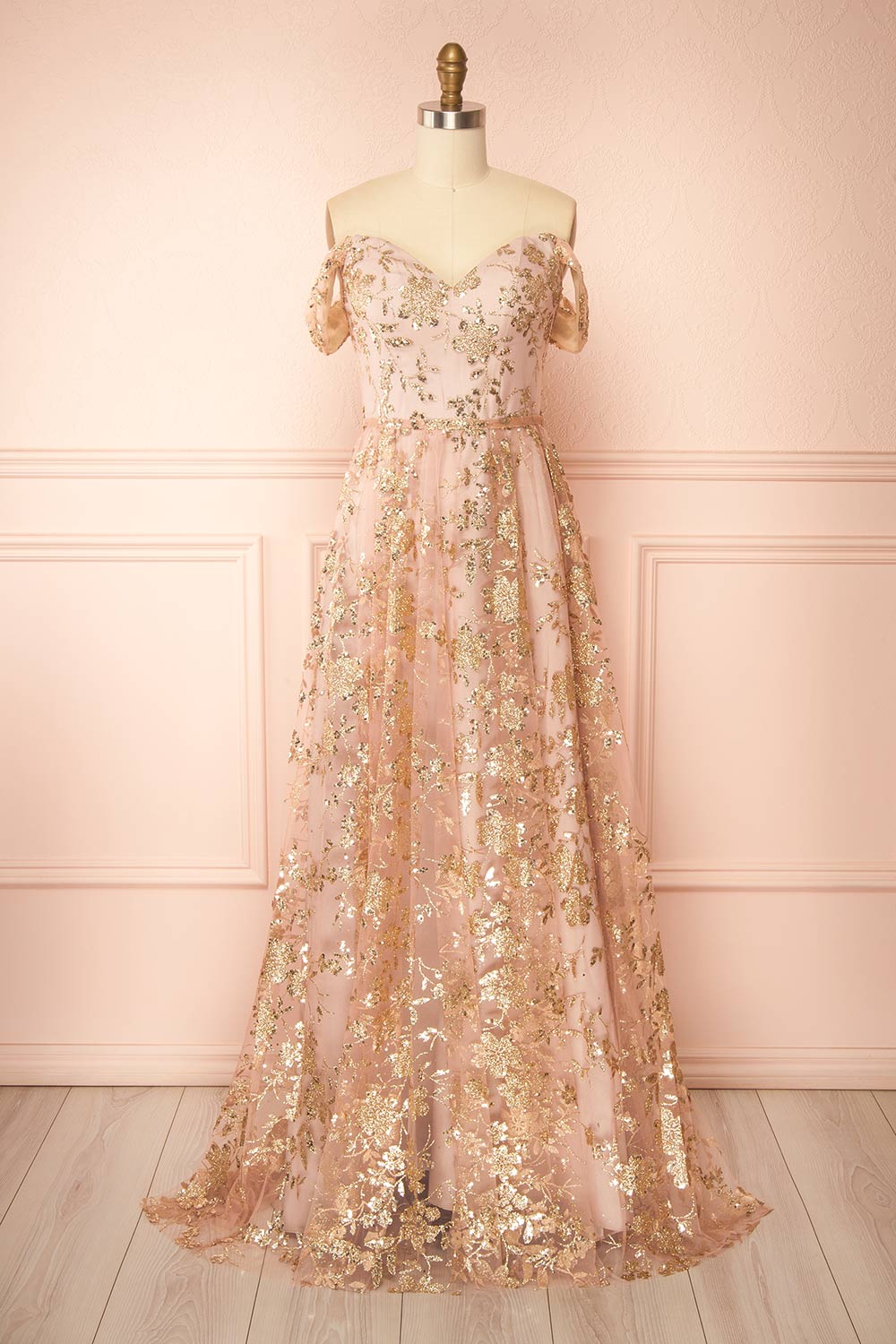 front view of sewing mannequin wearing Alienor Taupe Glittery Off the Shoulder Maxi Dress from Boutique 1861