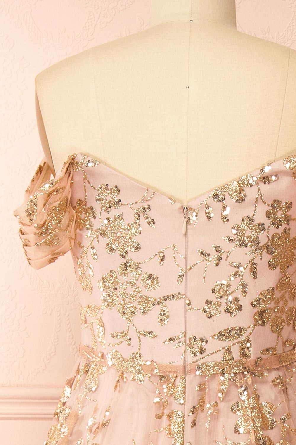 back of sewing mannequin wearing Alienor Taupe Glittery Off the Shoulder Maxi Dress from Boutique 1861