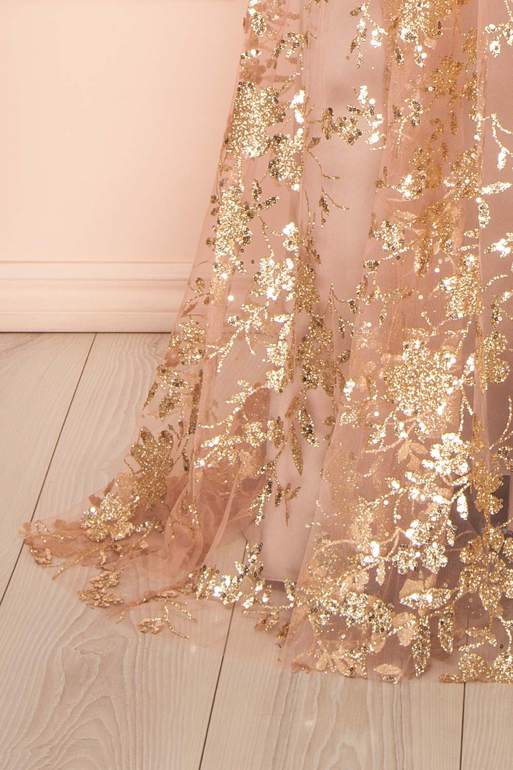 bottom of sewing mannequin wearing Alienor Taupe Glittery Off the Shoulder Maxi Dress from Boutique 1861