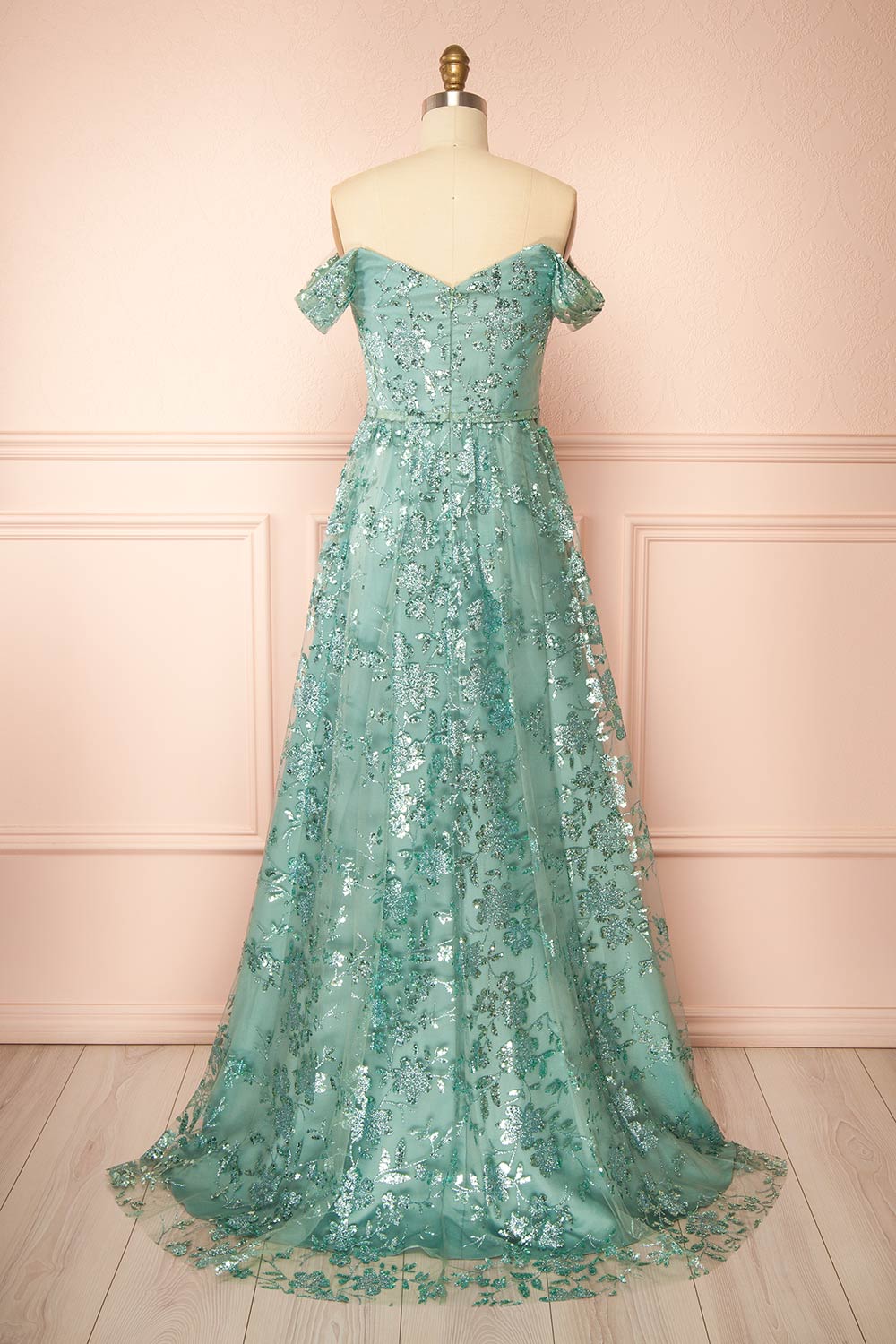 back view of sewing mannequin wearing Alienor Teal Glittery Off the Shoulder Maxi Dress from Boutique 1861