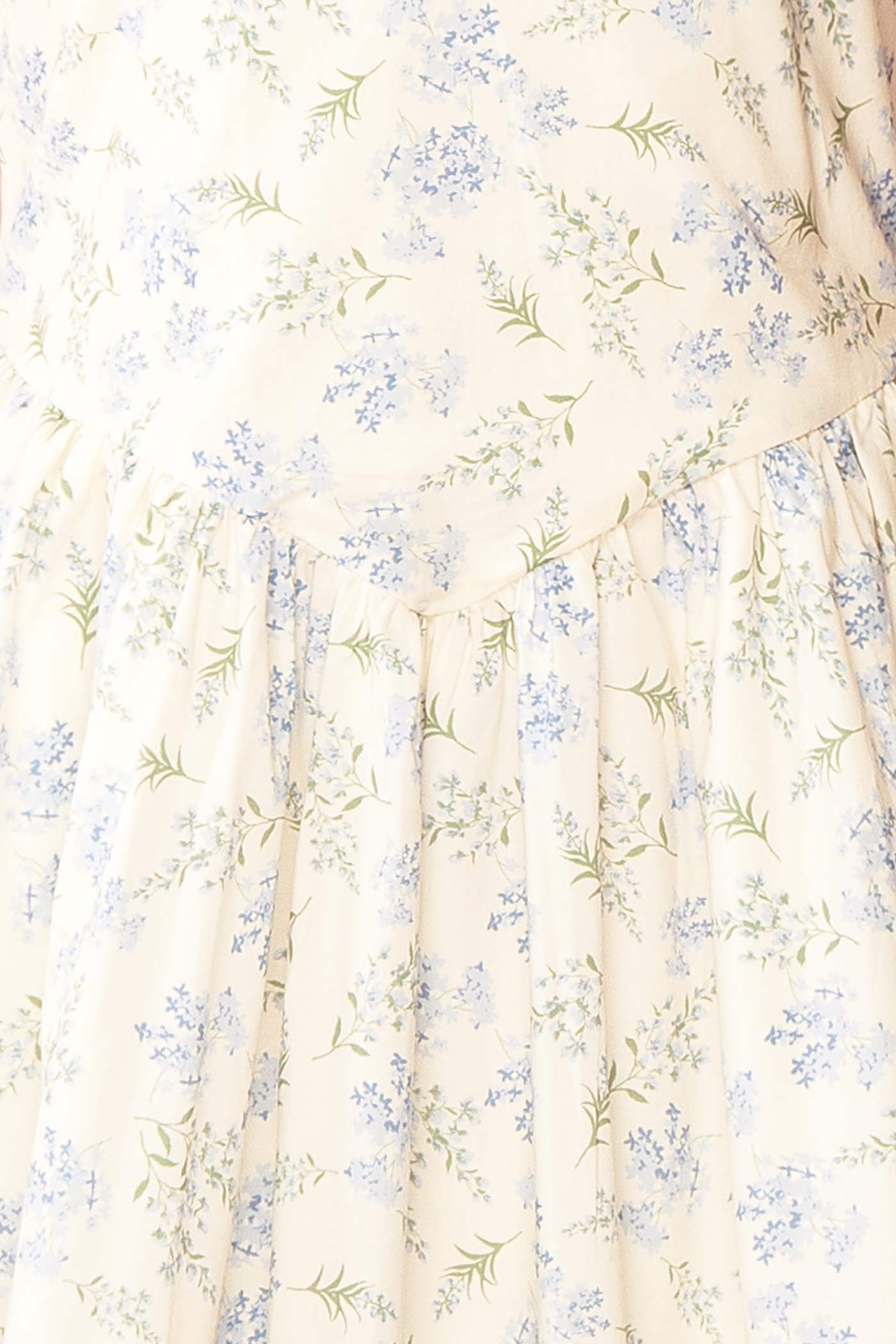 Close-up Amunel White Floral V-Neck Lace Trim Short Dress with Dropped Waist at la boutique 1861