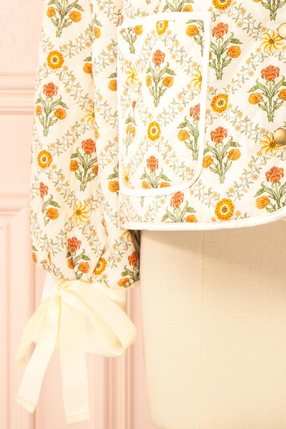 Anabeth Orange Floral Quilted Jacket with Ribbon-Tied | Boutique 1861 sleeve