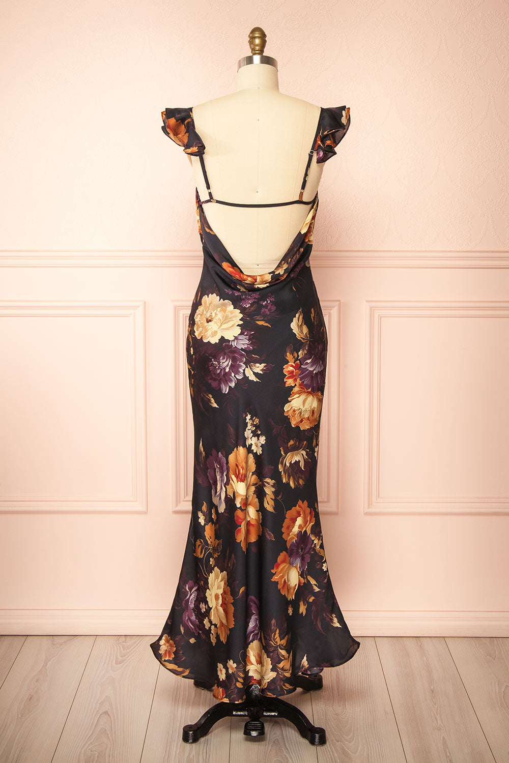 back view of a sewing mannequin wearing the Angella Floral Satin Dress from Boutique 1861