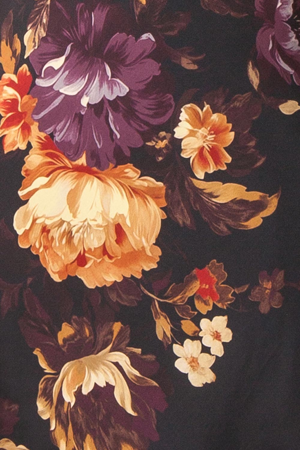 fabric of a sewing mannequin wearing the Angella Floral Satin Dress from Boutique 1861