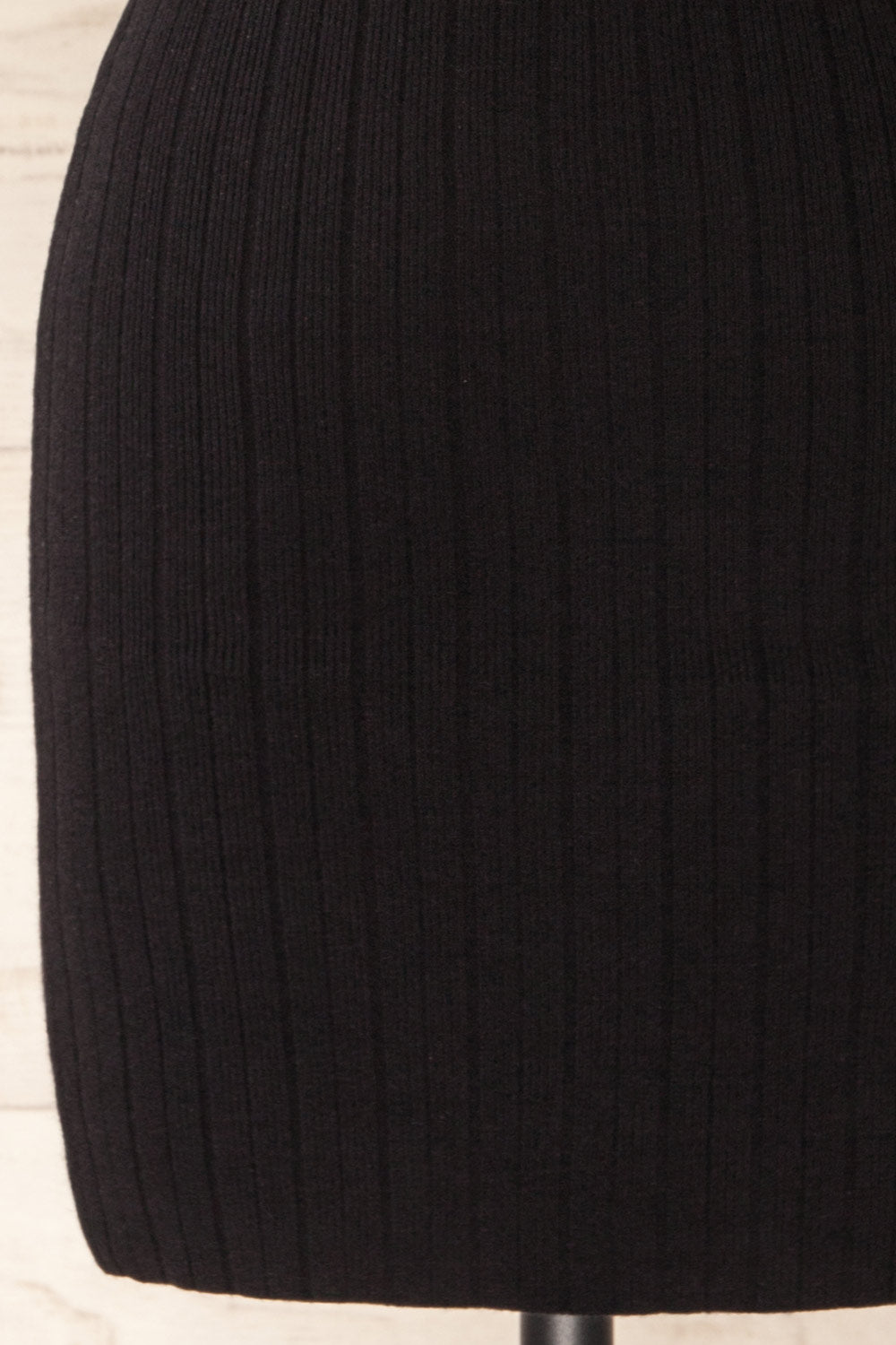 Antibes Black Short Ribbed Knit Dress | La petite garçonne bottom close-up