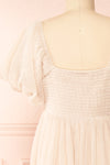 Araminta Pleated Beige Maxi Babydoll Dress | Boutique 1861 back close-up