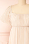 Araminta Pleated Beige Maxi Babydoll Dress | Boutique 1861 front close-up
