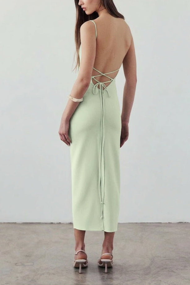 Woman wearing Arannia Mint Fitted Midi Dress with Laced Back from Arti Gogna | Boutique 1861