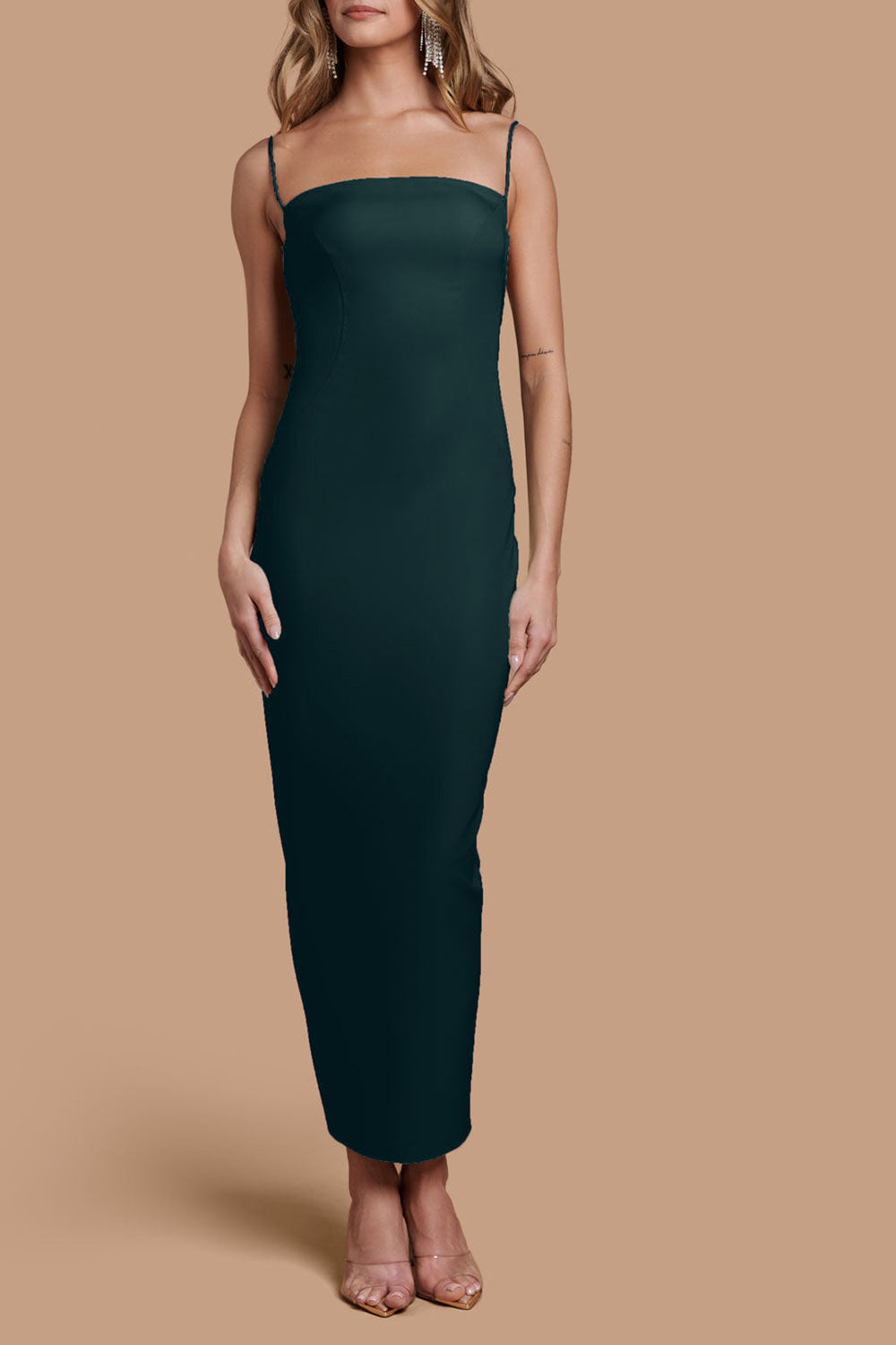 front of a woman wearing Arannia Green Fitted Midi Dress with Laced Back from Boutique 1861