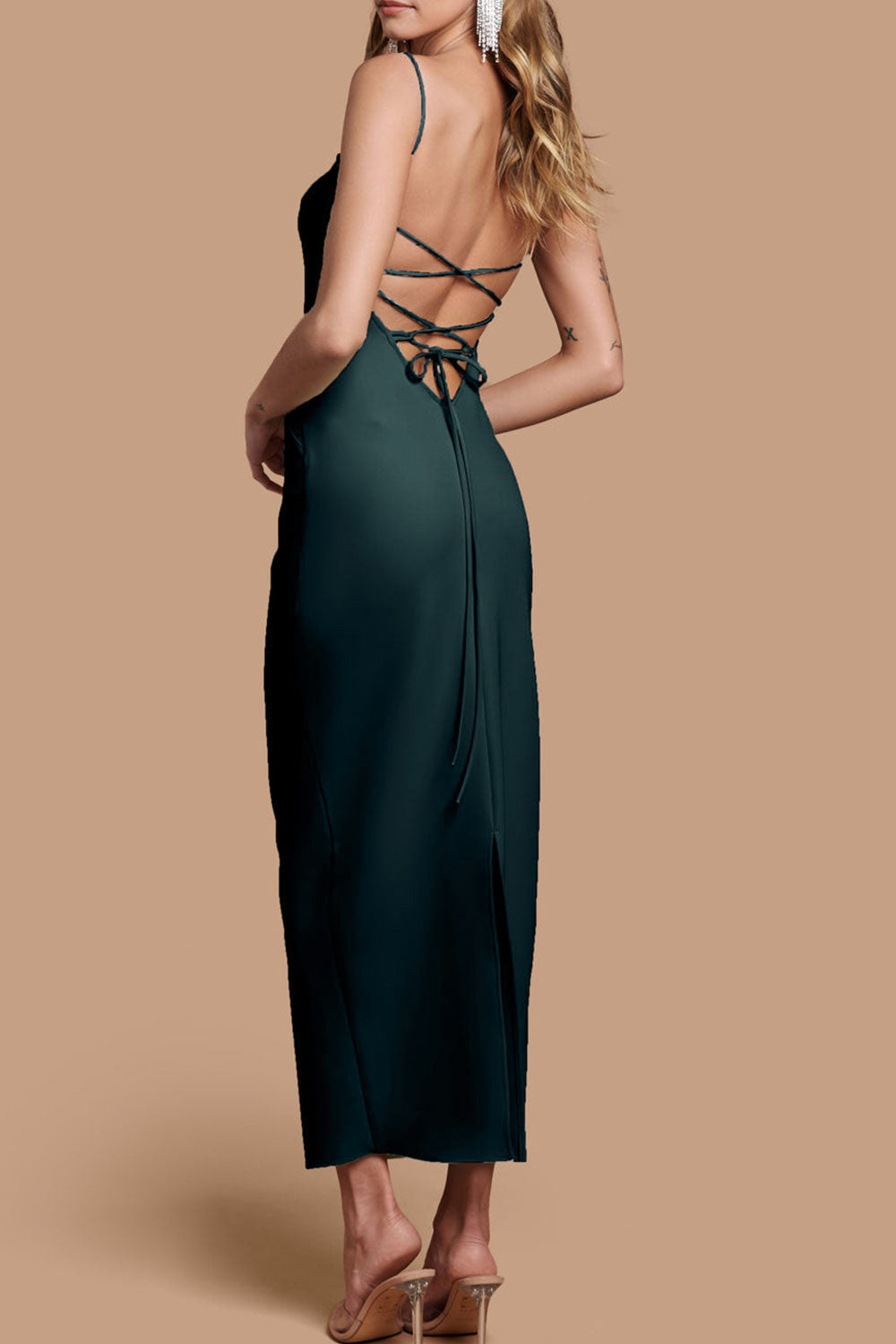 back view of a woman wearing Arannia Green Fitted Midi Dress with Laced Back from Boutique 1861