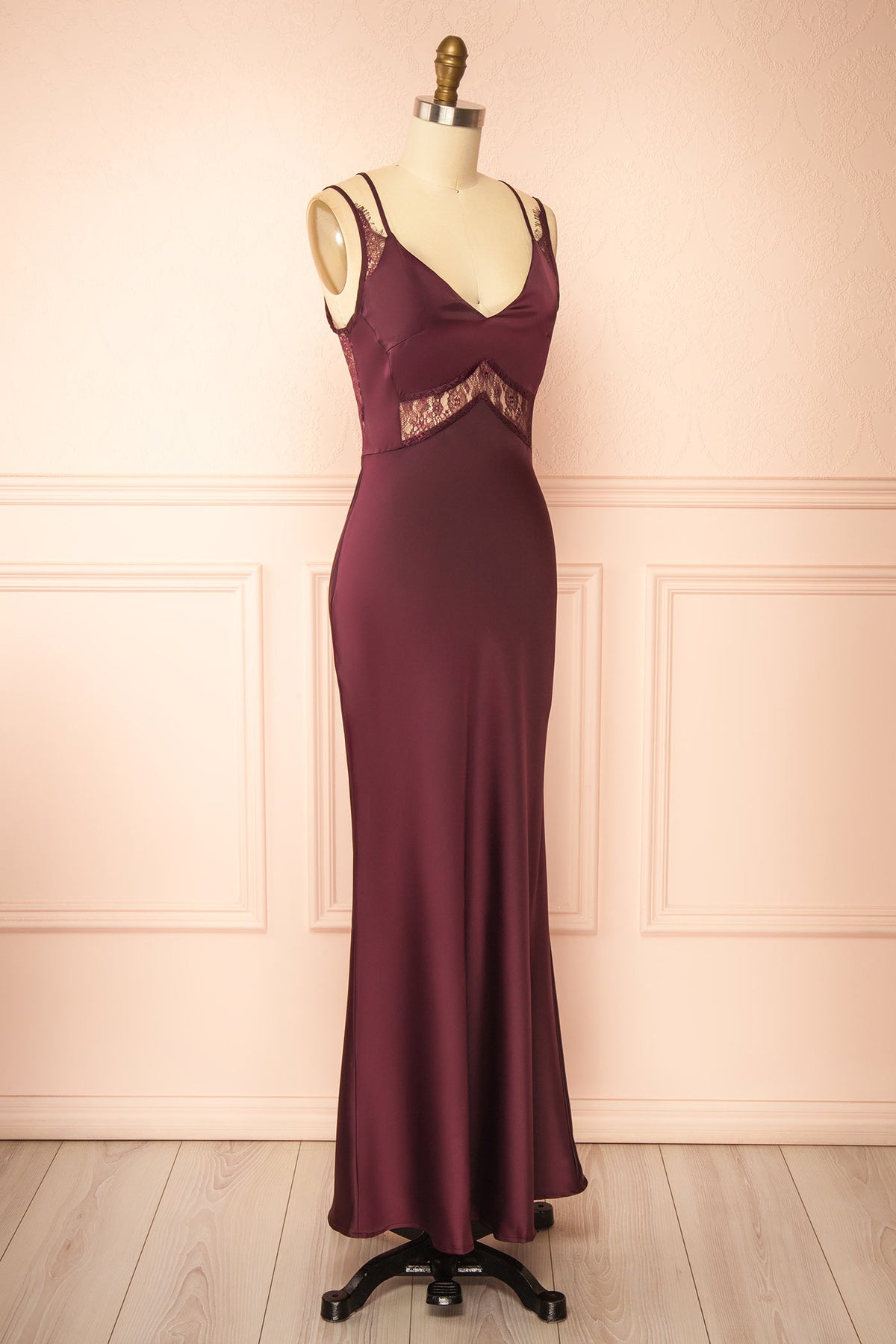 side view of Augustia Burgundy Satin Maxi Dress with Lace Accents and Strappy Cross Back at Boutique 1861