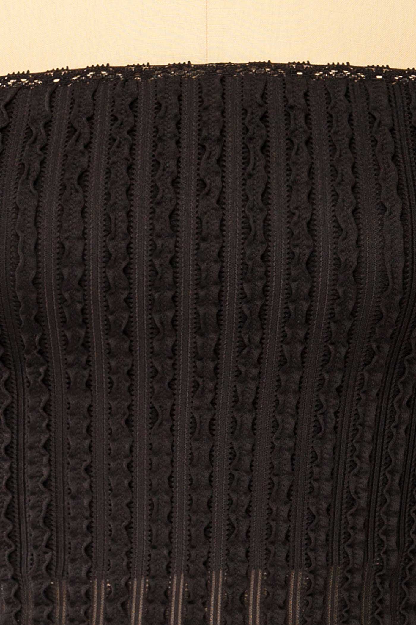 Close-up view Aureilly Black Textured Ruffle Bandeau Top at la petite garçonne