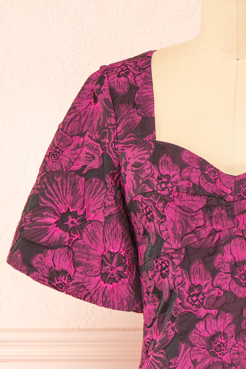 Avalora Short Black Floral Dress w/ Puffy Sleeves | Boutique 1861 front close-up