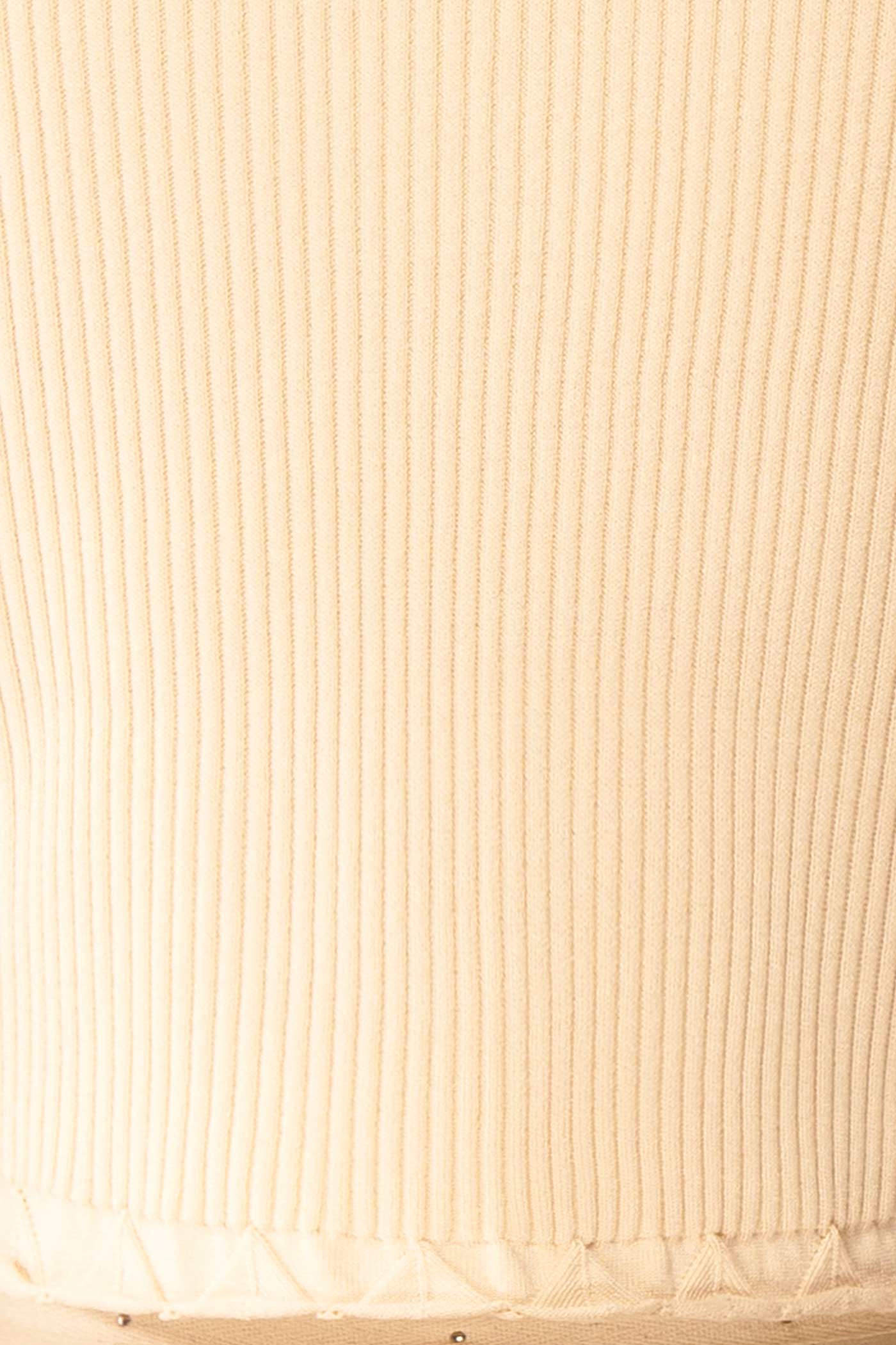 Close-up of Averie Beige Cropped Knit Bolero with Scalloped Edges from boutique 1861.