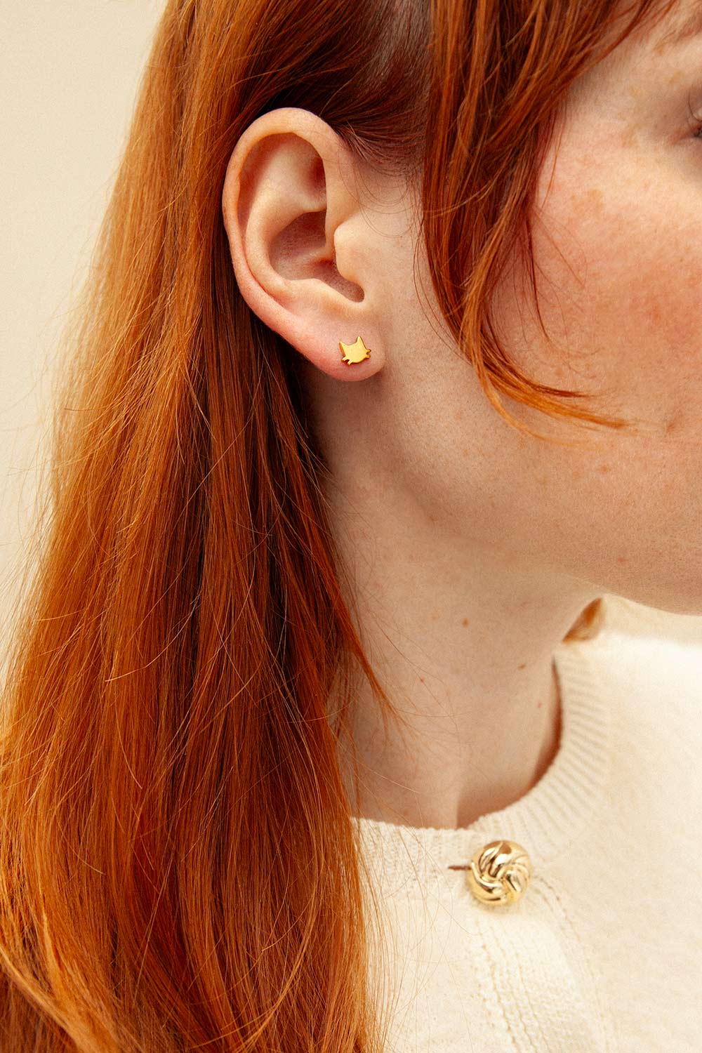 woman wearing Bandito Golden Kitten Earrings from La petite garçonne