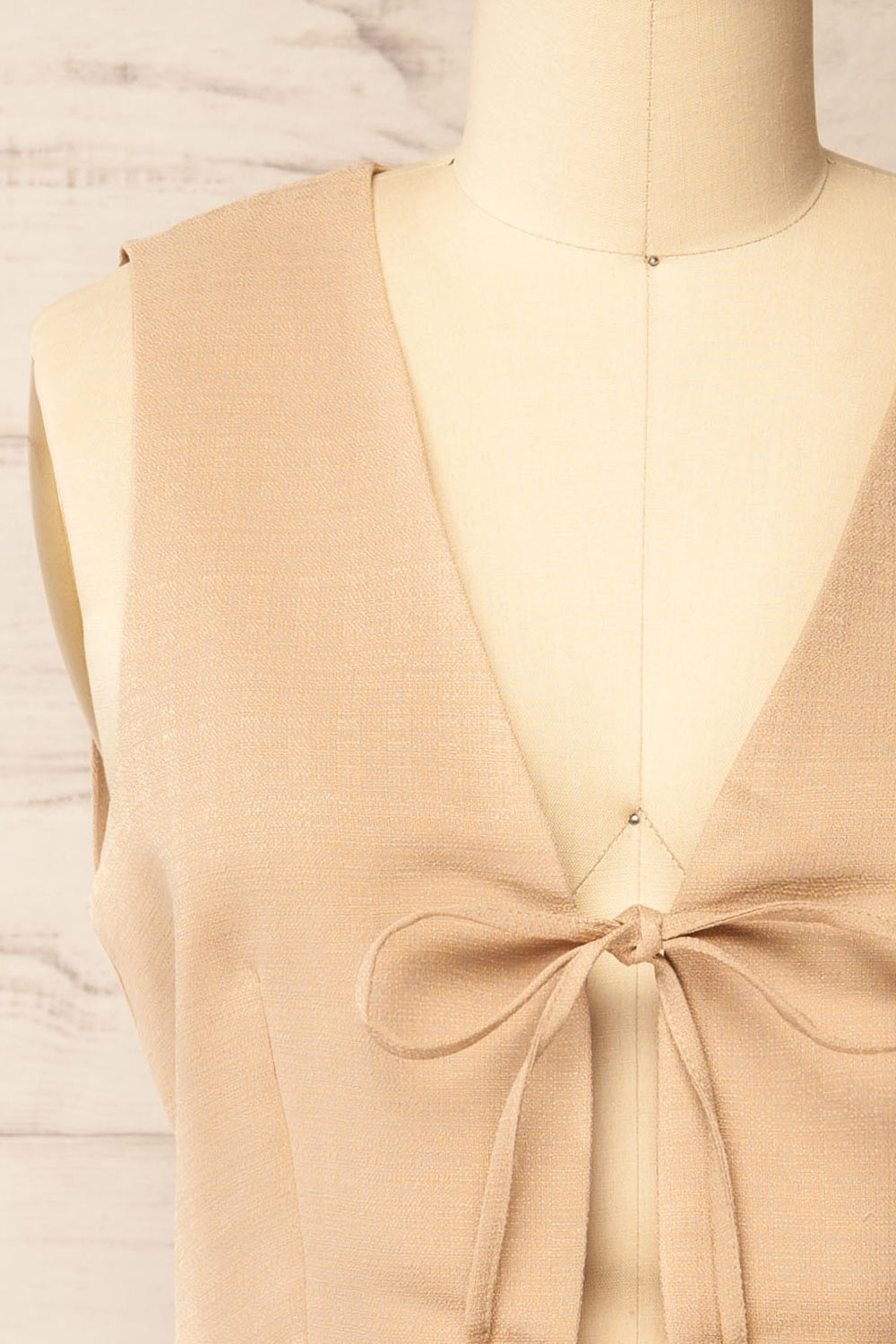 Barka Sleeveless Beige Waistcoat w/ 2 Bows | La petite garçonne front