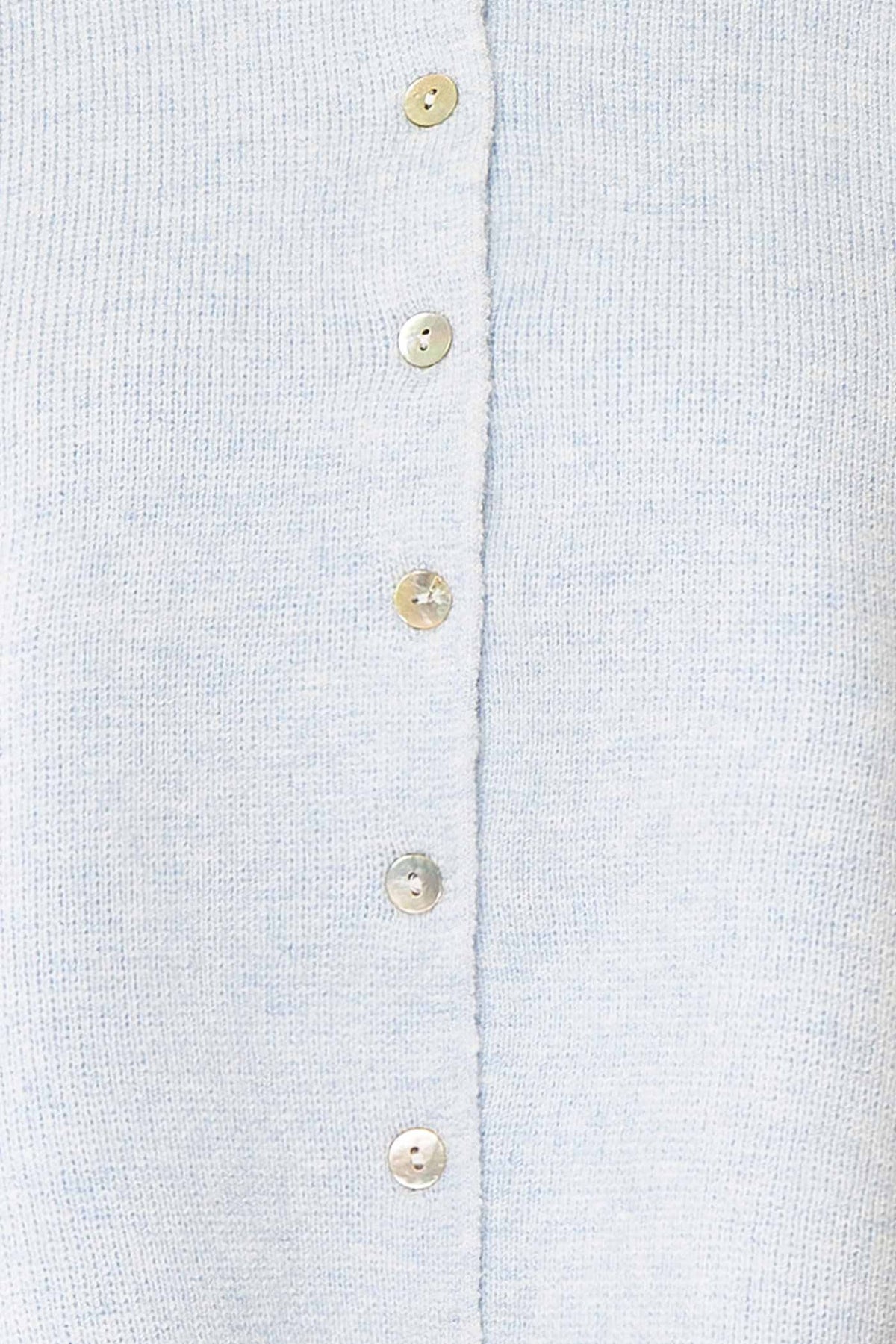 fabric view of Belza Blue Short Sleeve Puff Sleeve Cropped Knit Cardigan at Boutique 1861
