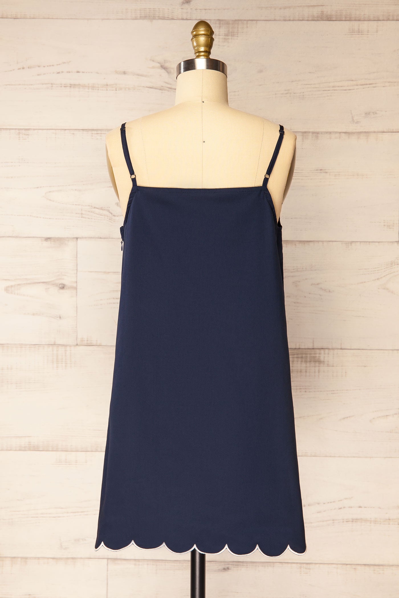 Backview Bithur Navy Scalloped Trim Short Dress with Contrast Piping at la petite garçonne