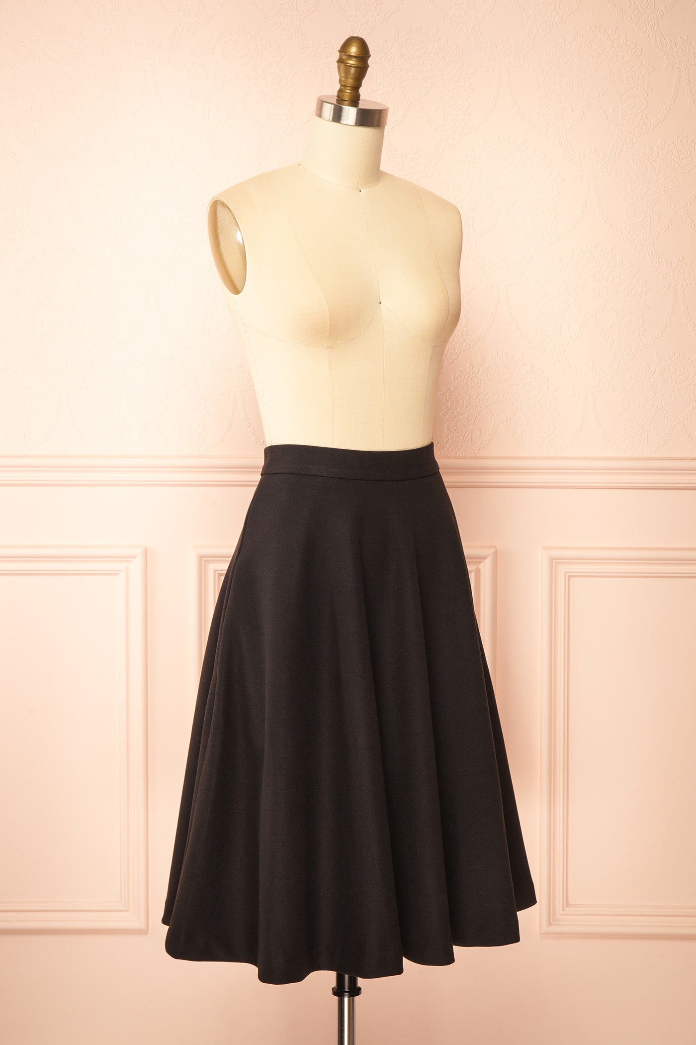 side view of Blaise Black High-Waisted Midi Skirt with Pockets at Boutique 1861