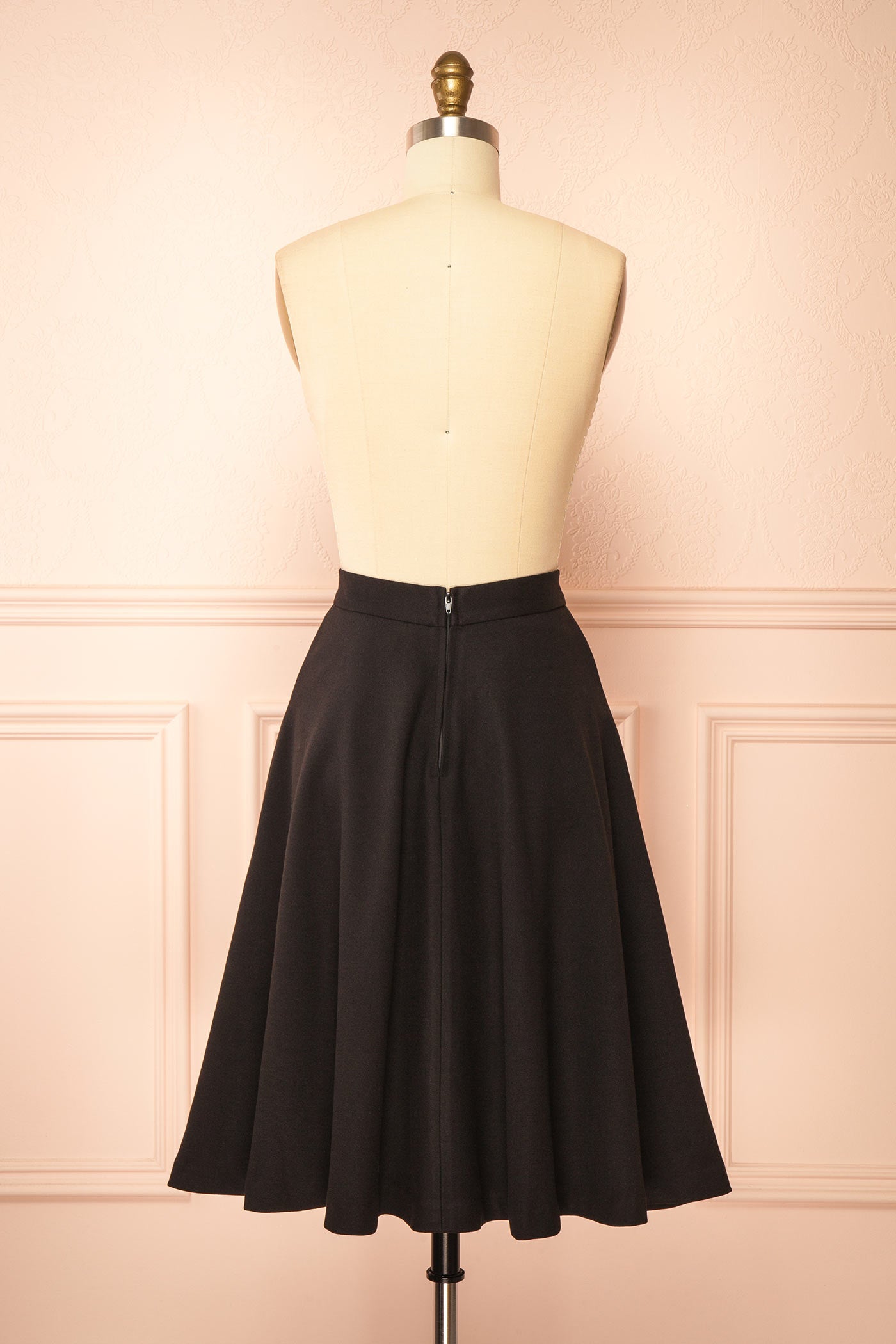 back view of Blaise Black High-Waisted Midi Skirt with Pockets at Boutique 1861