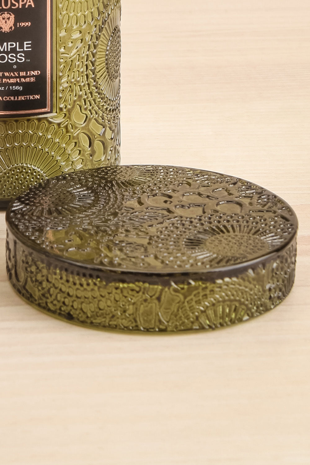 Temple Moss Medium Glass Candle by Voluspa | Maison garçonne lid close-up