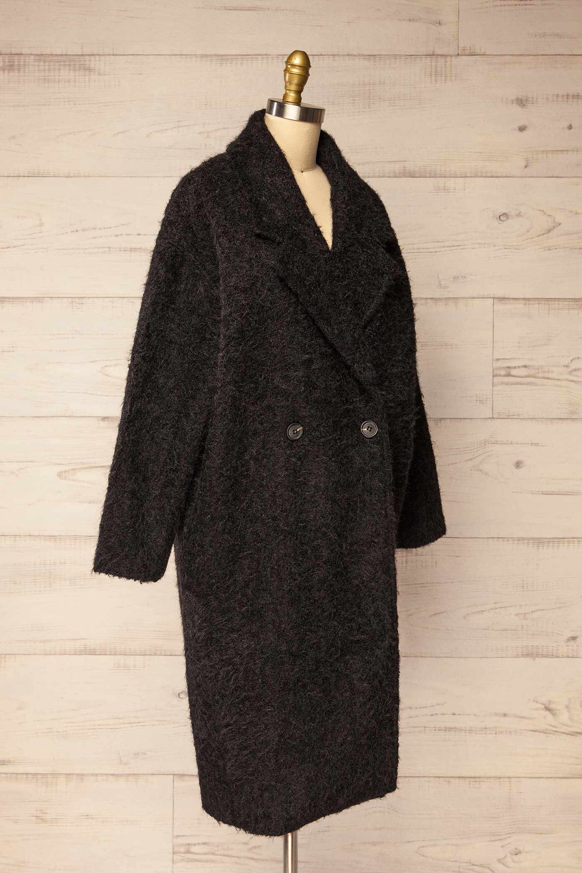 side view of Budhanil Black Long Fuzzy Coat at La petite garçonne