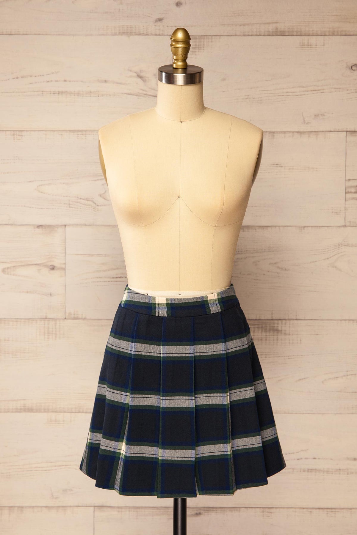 front view of Calenzana Plaid Pleated Mini Skirt at La petite garçonne