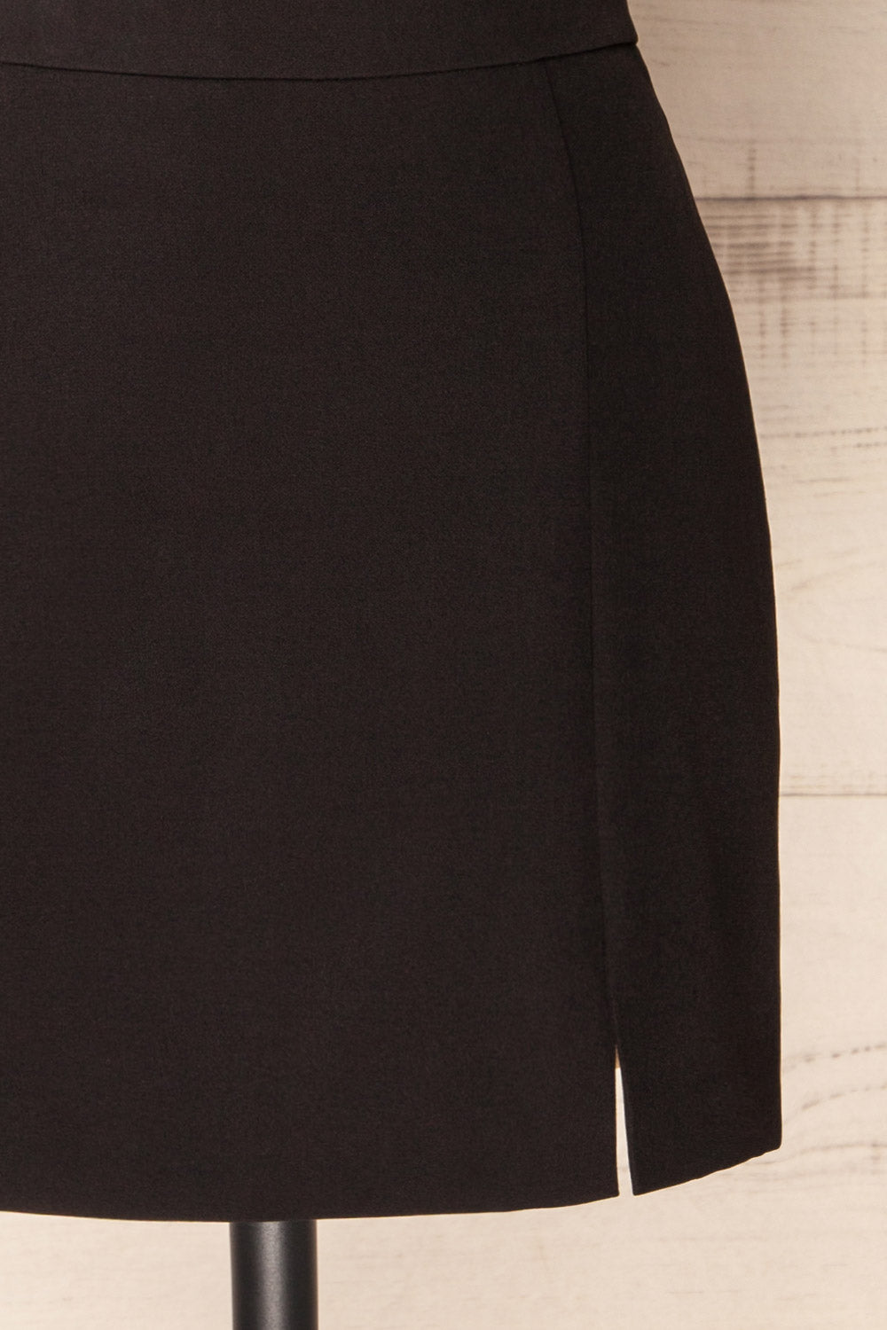 Cannes Short A-Line Black Skirt w/ Slit | La petite garçonne bottom close-up