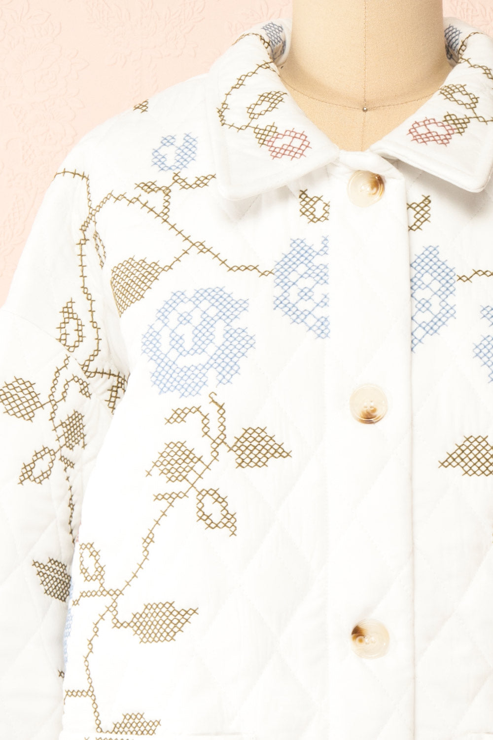 Carolyne White Quilted Jacket w/ Floral Embroidery | Boutique 1861 closed close-up