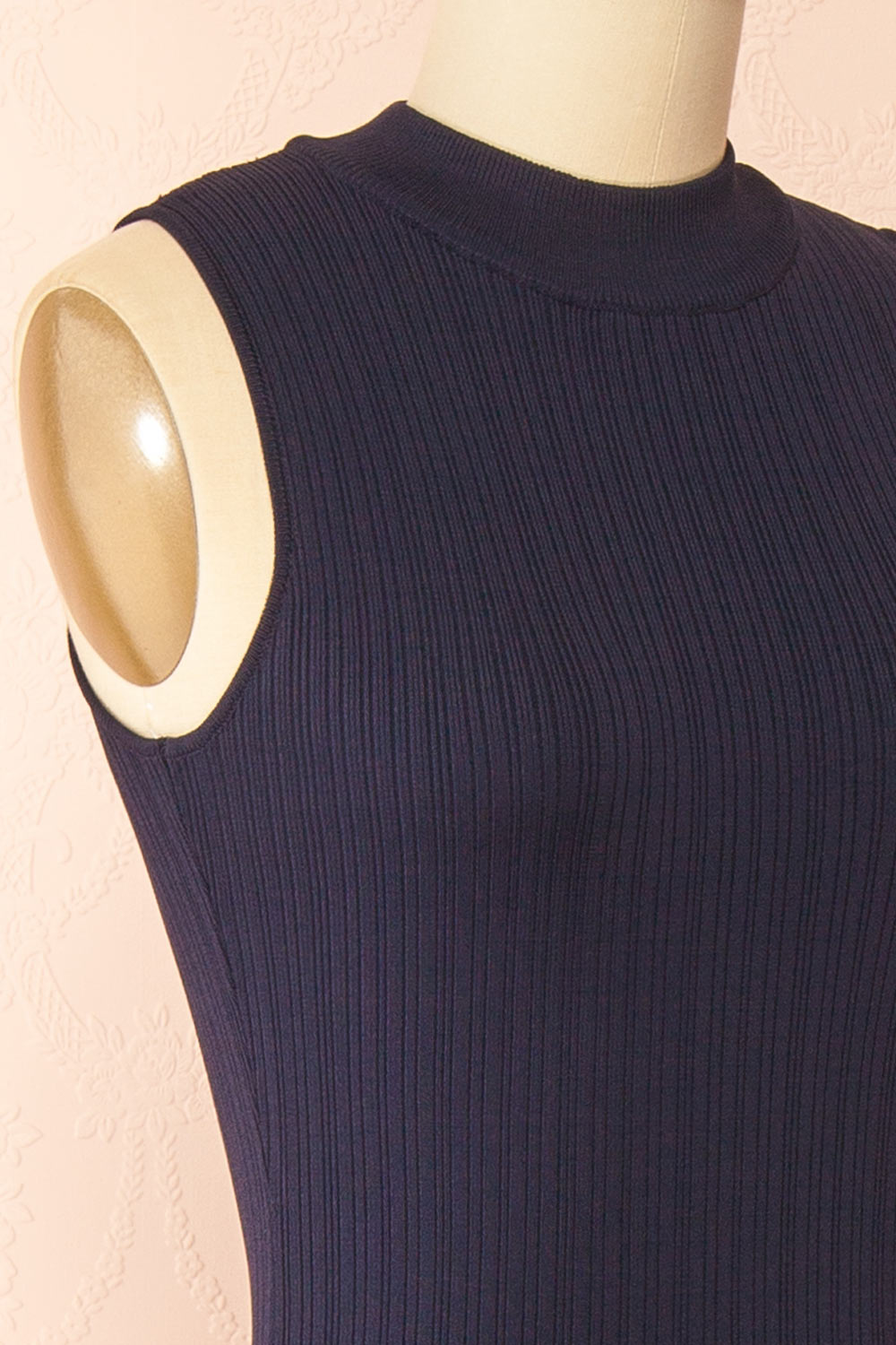 side of sewing mannequin wearing Christie Sleeveless Navy Midi Dress with Lace from Boutique 1861