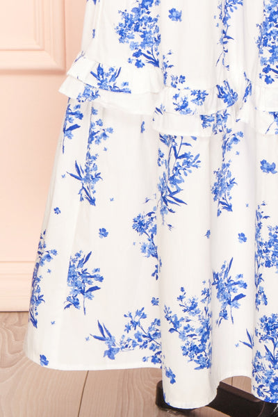 Claudia White Maxi Dress w/ Blue Floral Pattern | Boutique 1861 bottom