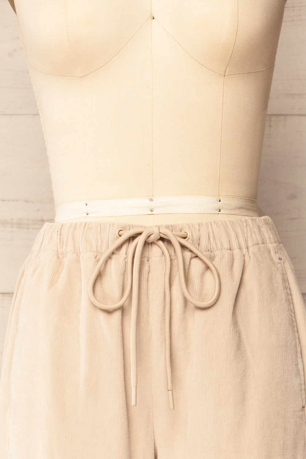 Clovis Beige Corduroy Pants with Adjustable Cord | La petite garçonne front close-up