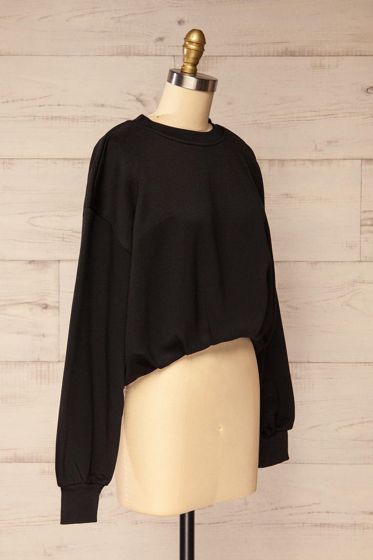 side view of Cobija Black Cropped Sweatshirt with Elastic Hem at La petite garçonne