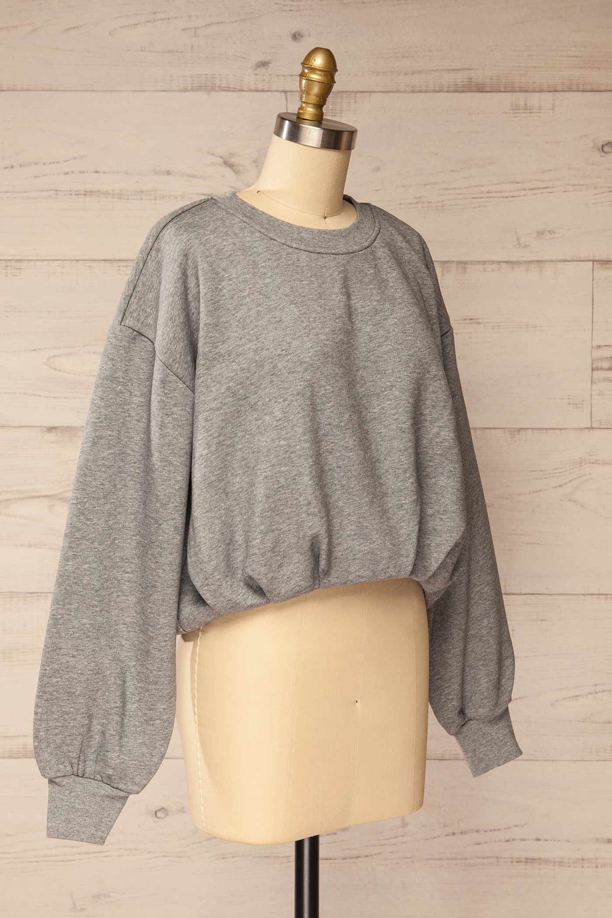 side view of Cobija Grey Cropped Sweatshirt with Elastic Hem at La petite garçonne