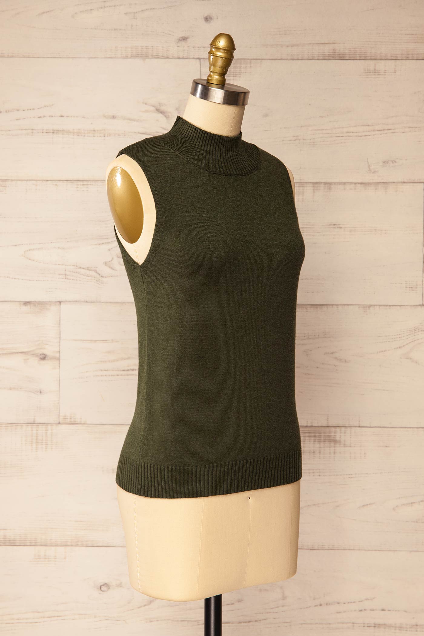 side view of Colbin Green Sleeveless Knit Top with Ribbed Hem at La petite garçonne