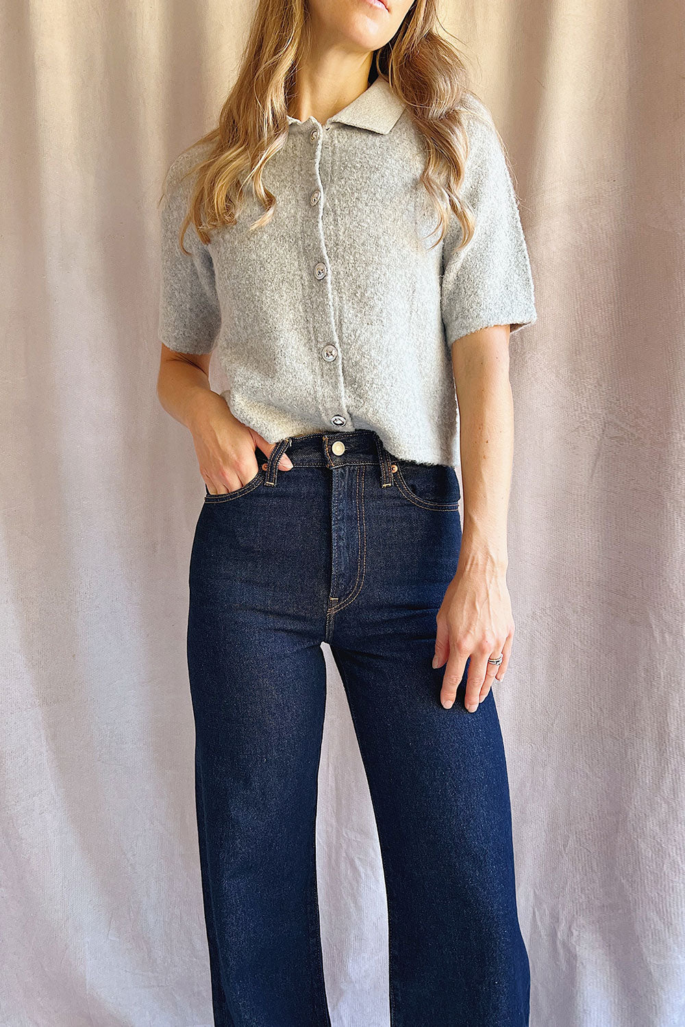 Woman wearing Kage Dark Wash High-Waisted Wide-Leg Jeans from La petite garçonne