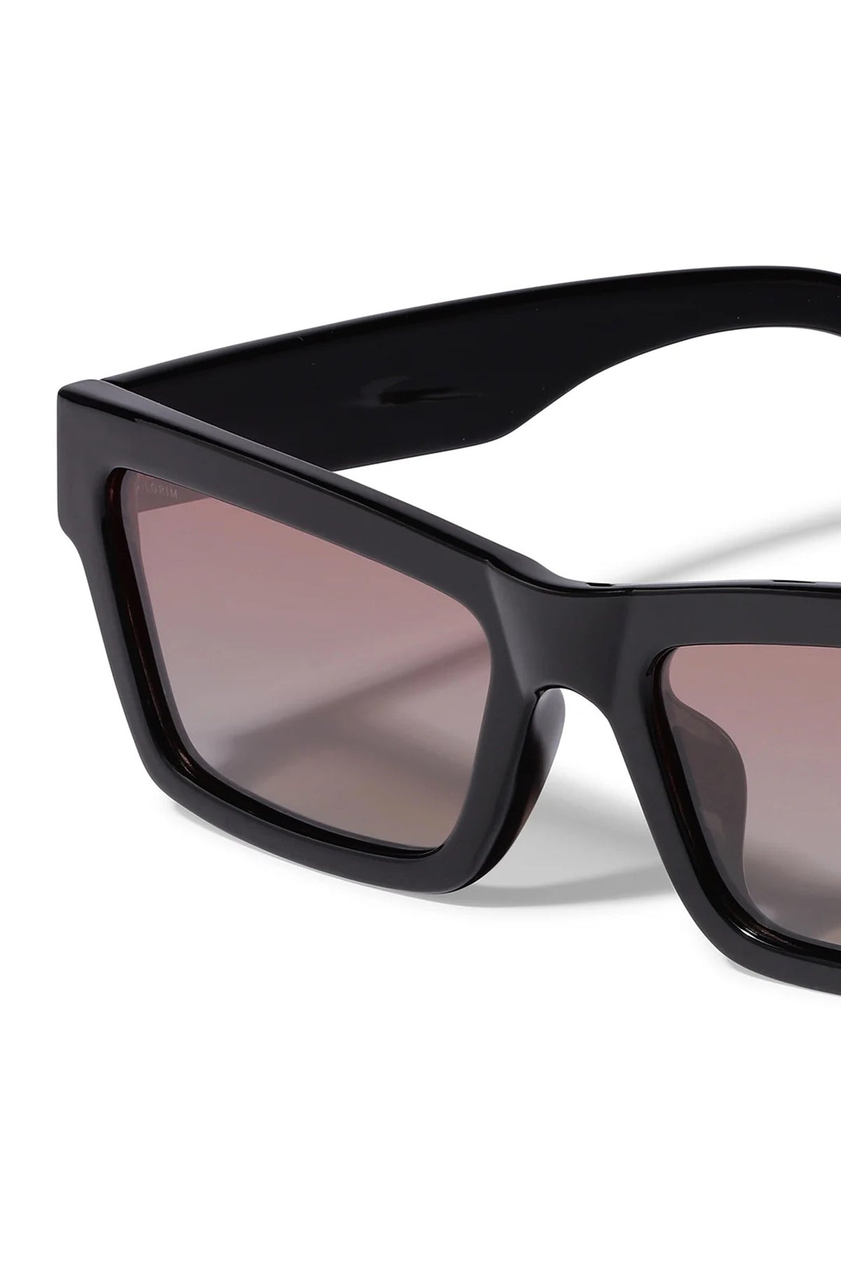 close-up of Crema Black Rectangle Frame Sunglasses by Pilgrim from La petite garçonne