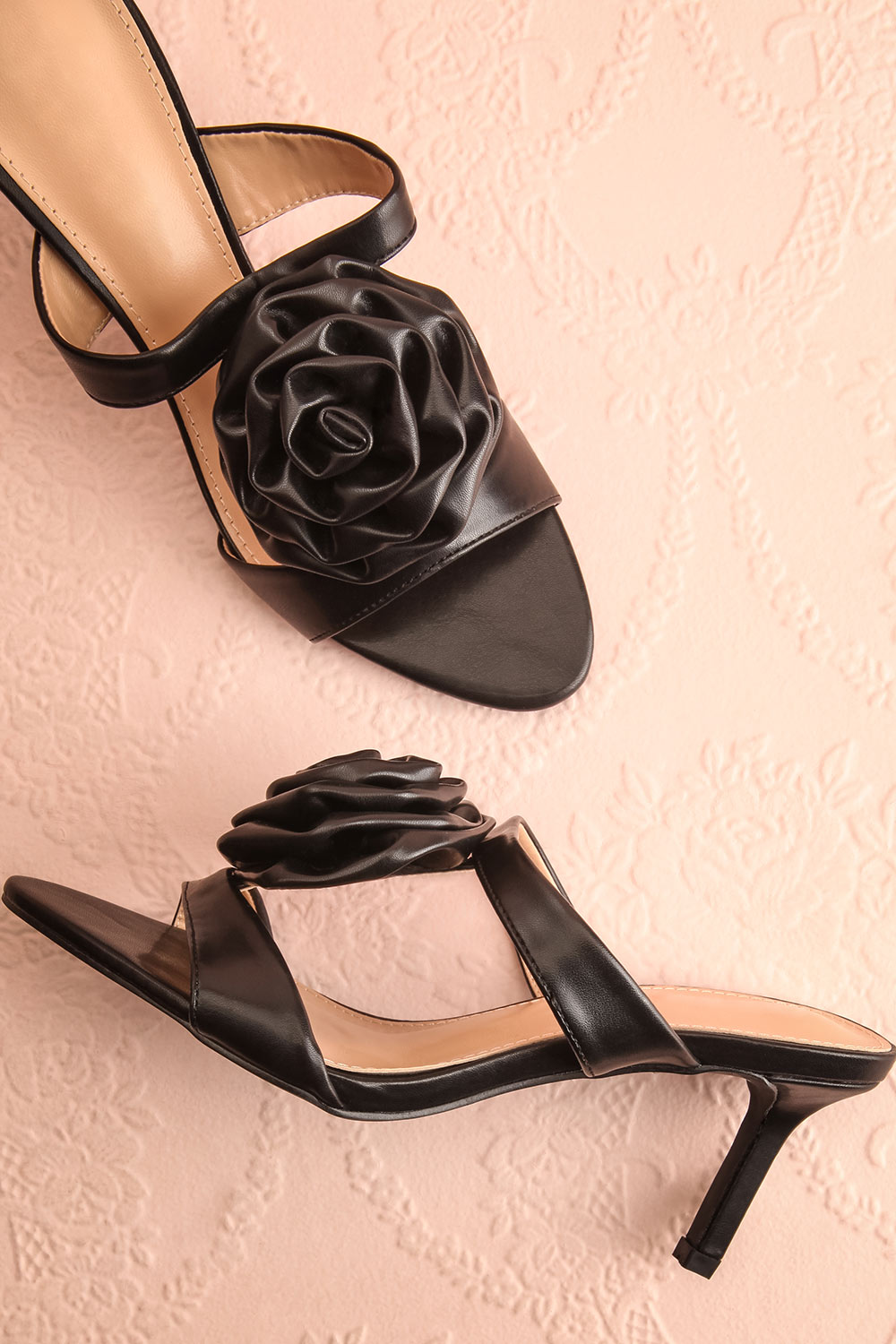 Cristine Black Faux-Leather Heels w/ Flower Detail | Boutique 1861 flat view