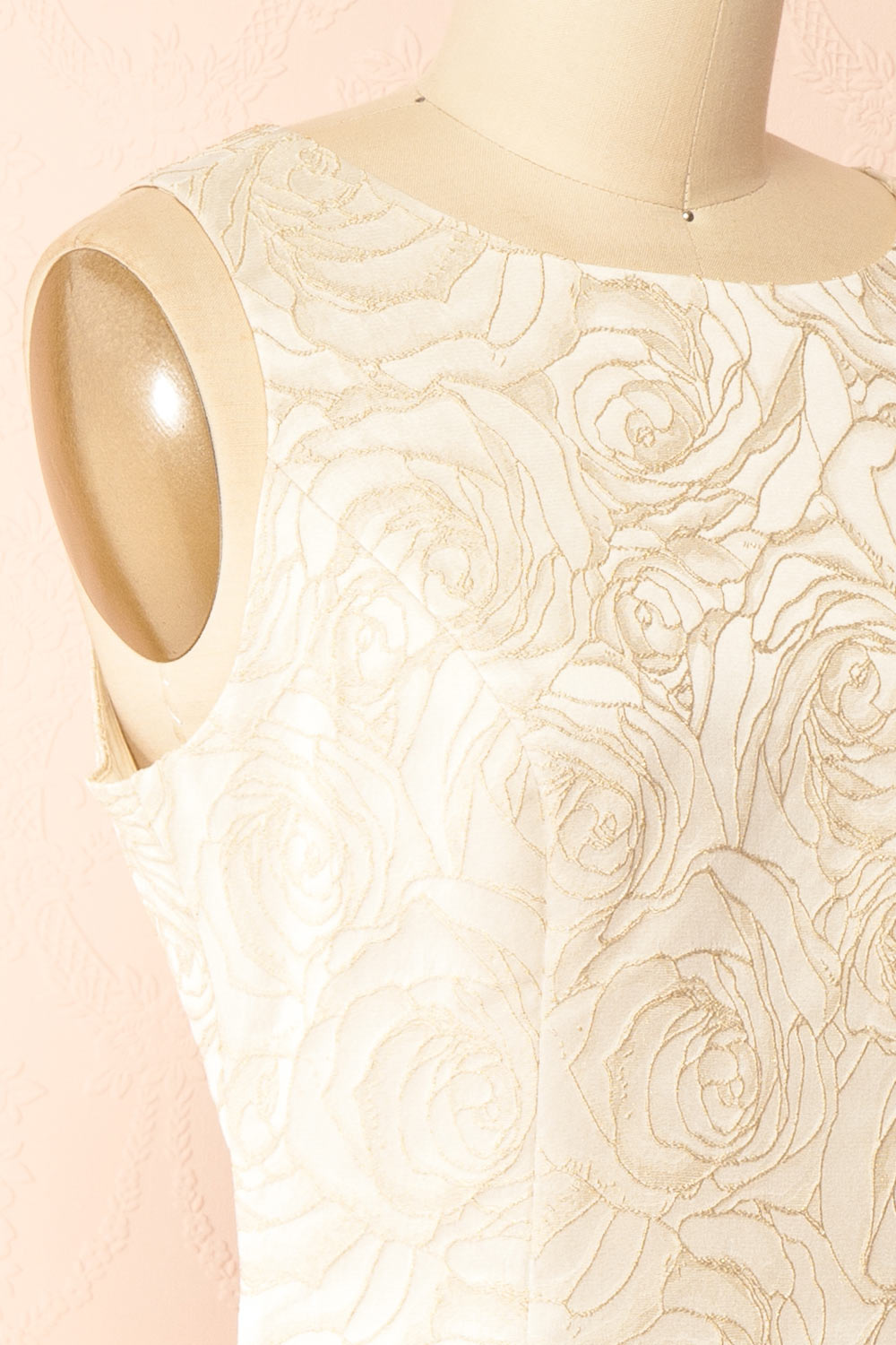 side of mannequin wearing Daenna Ivory, a Short Floral Embroidered Dress from boutique 1861