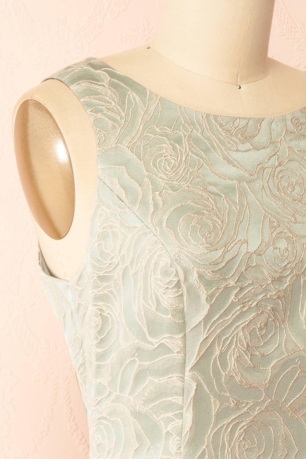 side of a mannequin wearing a Daenna Sage Short Floral Embroidered Dress from boutique 1861